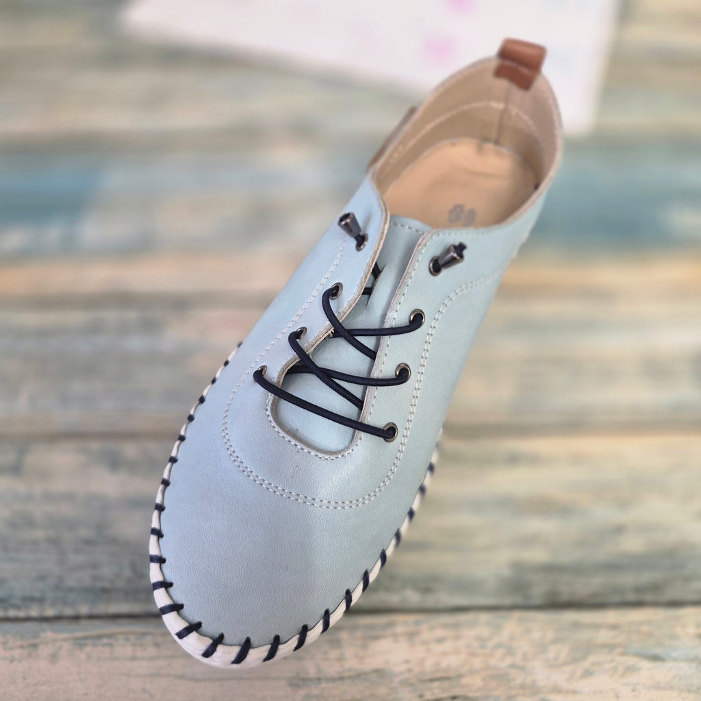Modella pale blue leather pumps, shoes.