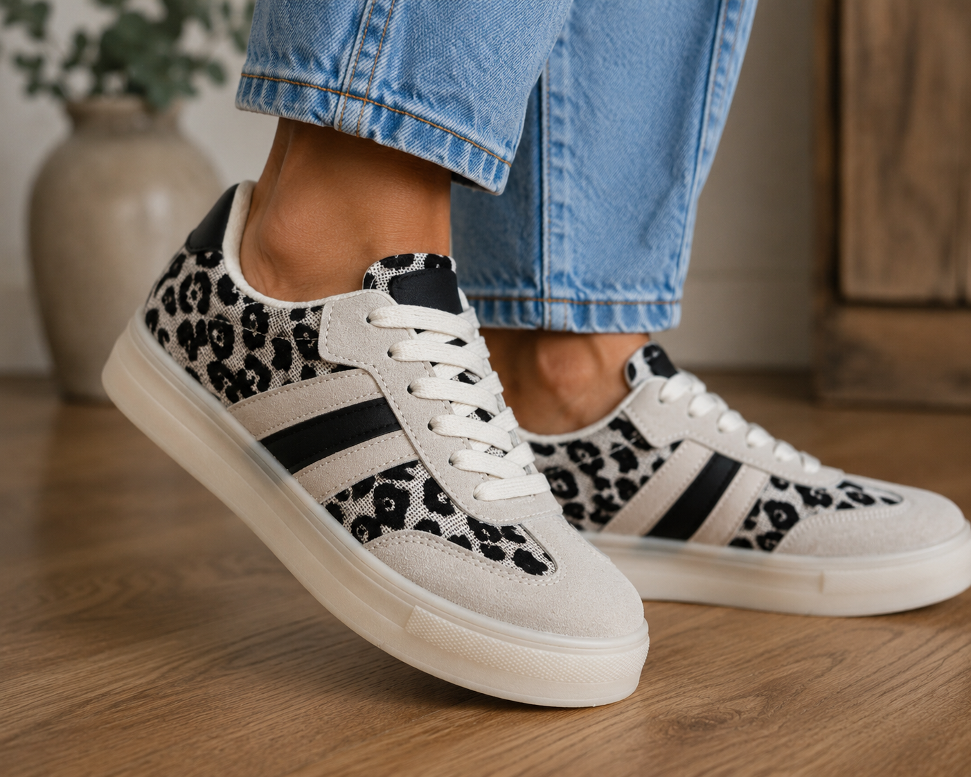 Leopard print platform trainers, white and black chunky lace up sneakers.
